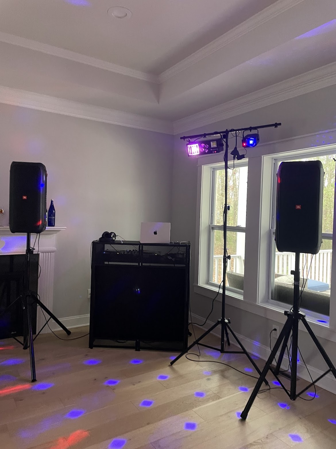 DJ Vito's equipment, including DJ controller, speakers, lights and microphone