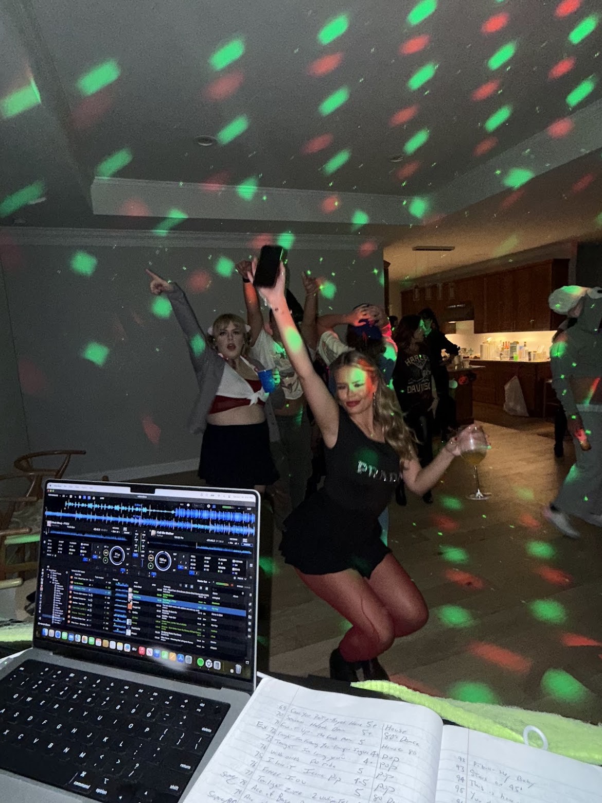 DJ Vito entertaining guests at a Halloween party