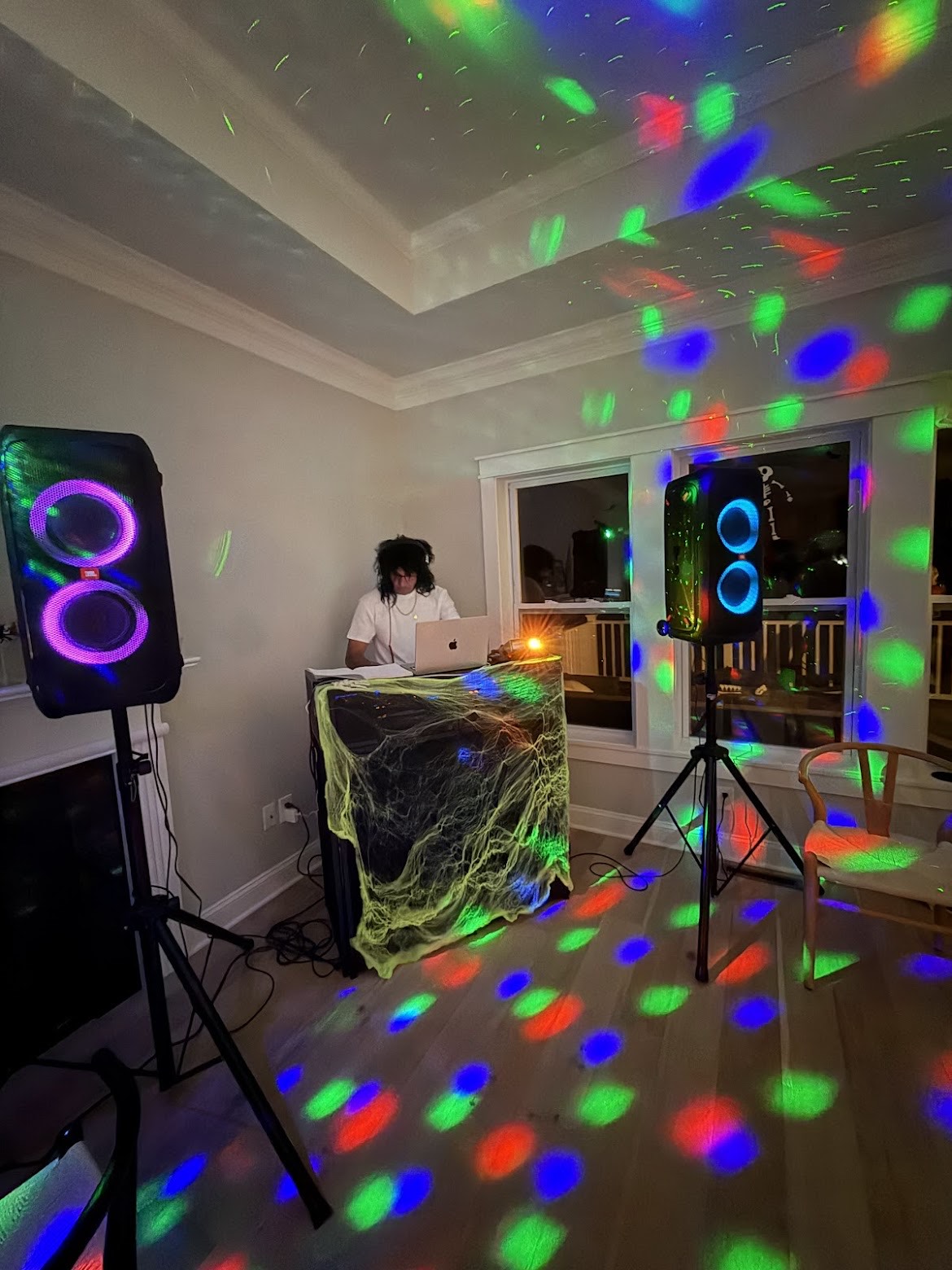 DJ Vito entertaining guests at a Halloween party