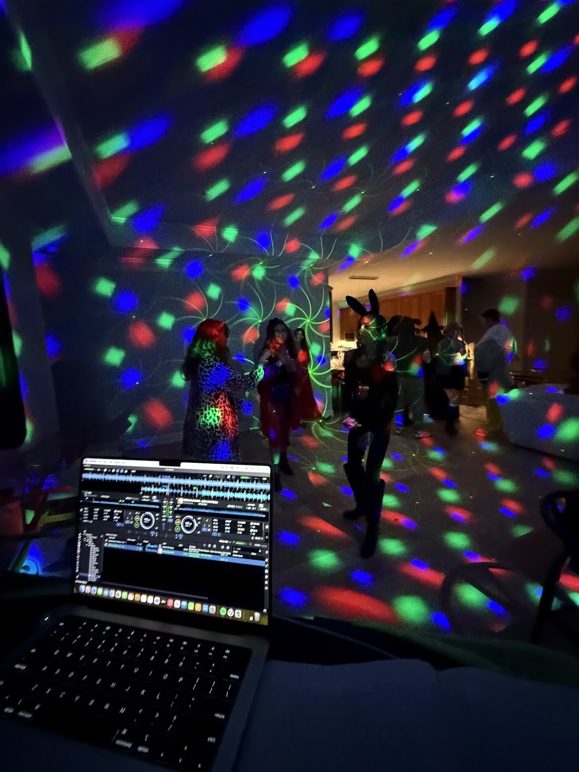 DJ Vito entertaining guests at a Halloween party