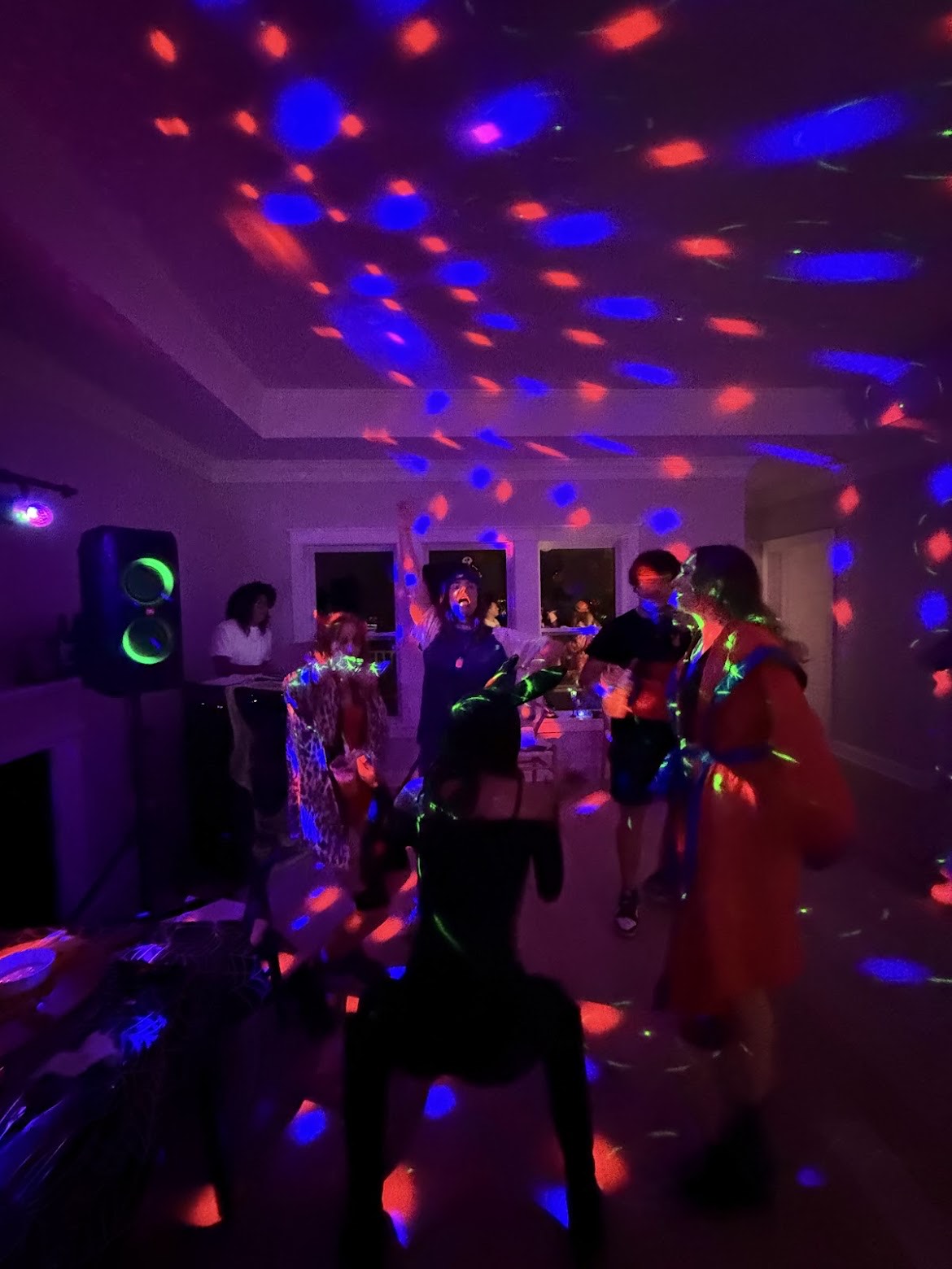 DJ Vito entertaining guests at a Halloween party